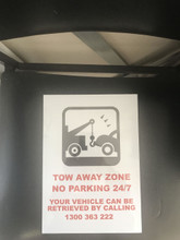 No Parking Sign with Logo of Tow Truck