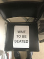 A 4 Wait To Be Seated Sign