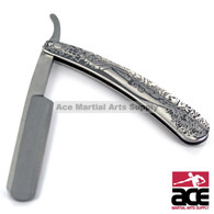 Acid-etched straight razor w/ Grim Reaper design. Stainless steel. 10" in total length (7" handle)