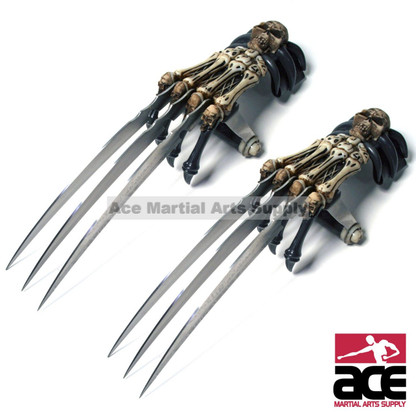 Includes 2. Slightly sharpened stainless steel blades. Features strap and handle. Resin skull design. 17" total length.