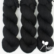 Signature Black Lively DK - skein is split into two skeins due to a knot/join. 260 yards