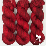 Ruby Love Artisan Sock - split into two skeins due to a knot/join.