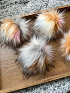 Neopolitan 5" faux fur pom pom with yarn ties and stabilizing button attachment