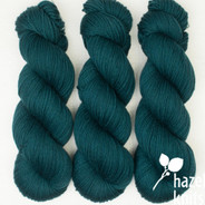 Really Philly Lively DK - approx 265 yards, split between two skeins, due to a join/knot. 