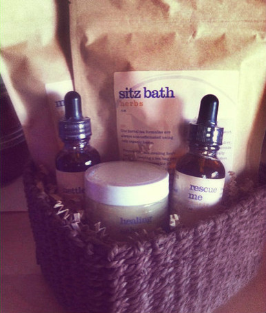 this is customized version of the New Mother's gift basket containing Sitz bath herbs, Mer-Maid tea, Healing Salve and Rescue remedy.