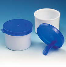 Fecal container with attached spoon