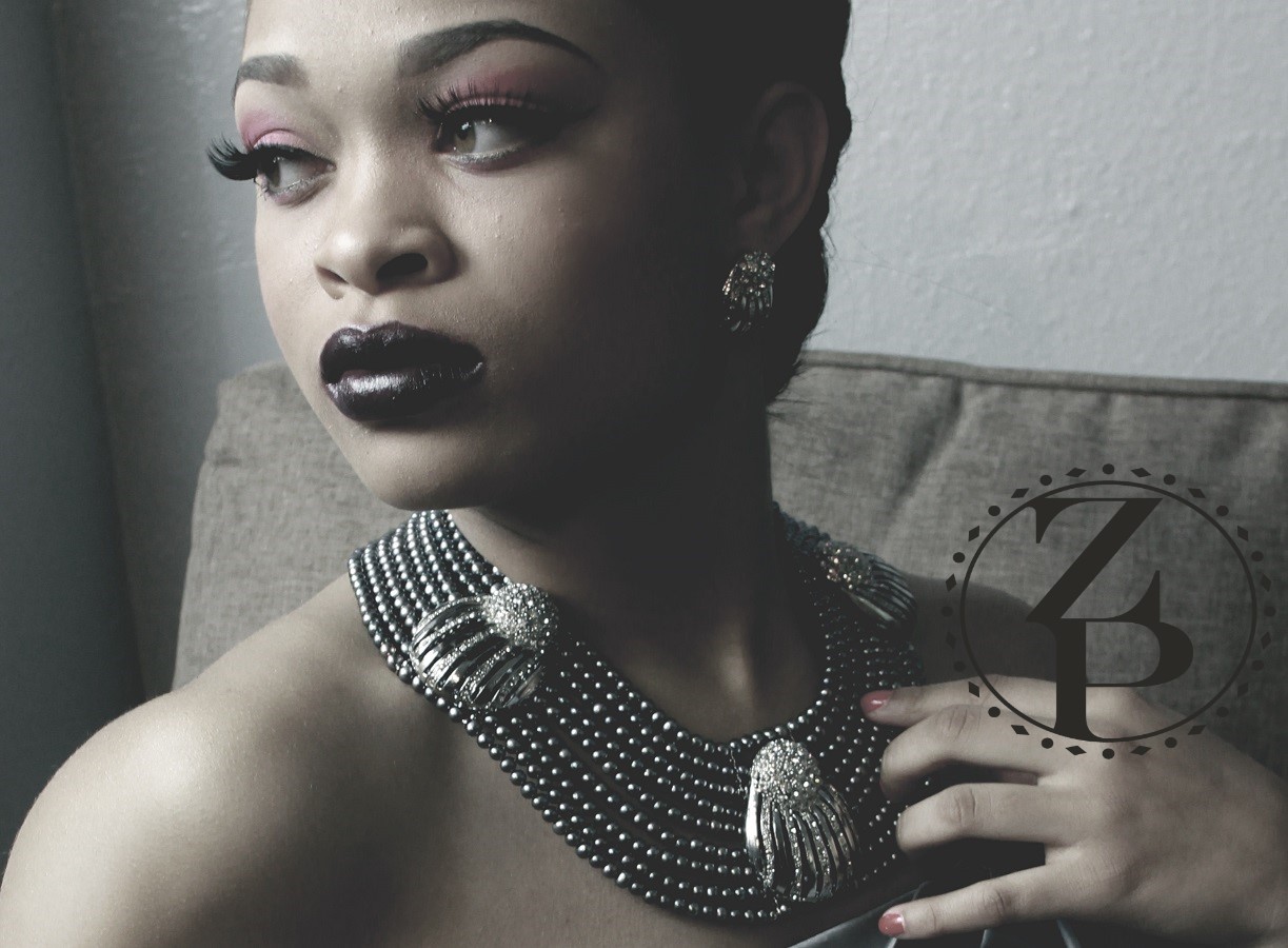 elegant-woman-in-grey-pearl-statement-necklace-editorial-photo-shoot.jpg