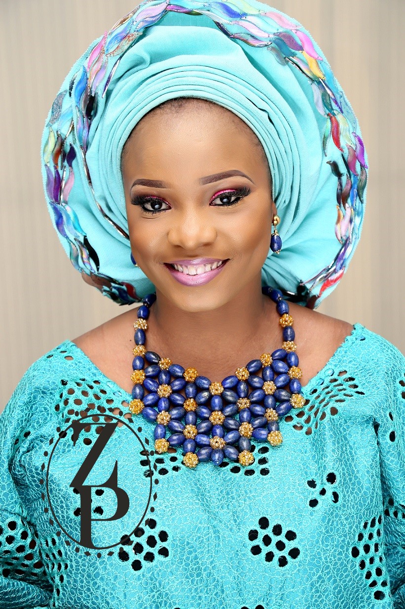 nigerian-yoruba-woman-in-teal-wedding-aso-oke-and-blue-bead-jewelry-zuri-perle.jpg