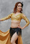 woman with a gold akhet holographic lycra mock wrap top