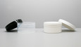 Plastic Jars and caps shown in photo:
(L) Regular Wall: 100mm - 8 oz Clarified; 100mm Smooth Cap Black
(R) Regular Wall: 100mm - 8oz White; 100mm Smooth Cap White

NOTE: Plastic Jars and Caps are sold separately.

