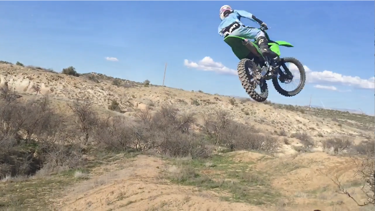 2011 Kawasaki KX250F with JBI Suspension Pro Shock in action free riding.