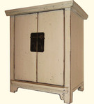 Vanilla lacquered Elmwood 19  inch H. Oriental Cabinet carved apron, brass hardware with shelf .