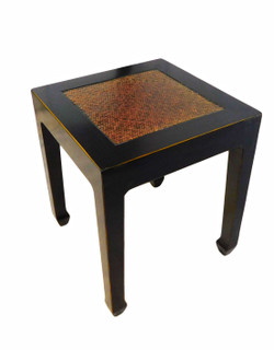 Antique black lacquered Oriental end table has a rattan top and Tamu