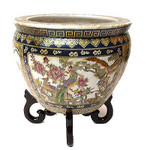 Chinese porcelain Fish Bowl. Red, gold and green flower design with  fish design inside.  14  inch diameter