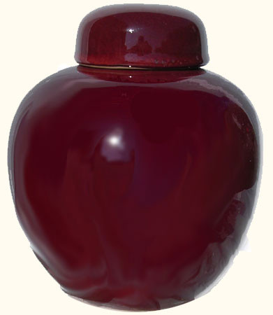 8 inch high  Chinese porcelain ginger jar has an oxblood red glaze. Import direct pricing!