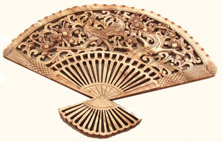 Bird and flower design carved 19 by 14 Camphor Fan