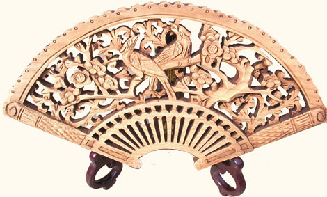 Fan shaped camphor wood carving
