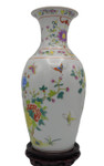 Fish tail vase, white background, colorful, yellow and fuchsia flowers, colorful peacock