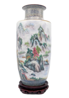 White vase with rock outcrop and water scene