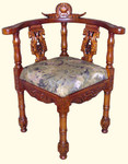 Heavy carved corner chair