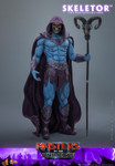 A front view photo of the Hot Toys Masters of the Universe Skeletor one sixth scale collectible figure wielding the Havoc Staff in a menacing pose.