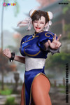 The front view of the PLAY TOY P019EX-A one sixth scale Fighting Goddess action figure highlights the tailored fabric blue fighting dress and iconic spiked wristbands.