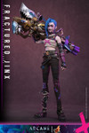 Jinx holds her iconic Fishbones rocket launcher and Pow Pow minigun weapon accessories in a dynamic action pose.