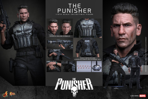 The Hot Toys MMS904 standard dynamic pose shows Jon Bernthal as The Punisher standing complete in his weathered skull tactical vest holding a heavy assault rifle.