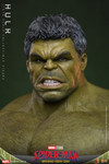 Detailed view of the Hot Toys Hulk clenched teeth interchangeable face plate showing realistic Mark Ruffalo likeness and short black hair sculpt.