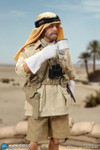 This photograph showcases the diecast metal submachine gun and sidearm equipment included with the DID K80197 figure set.