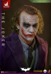 A close up view of the 1/4 scale Heath Ledger Joker head sculpt highlighting the hand implanted green wool hair and rolling eyeball feature