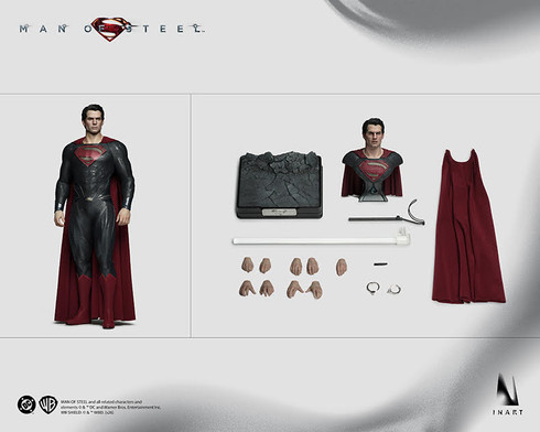 Front view showcasing the INART Man of Steel Superman figure wearing his blue textured suit and red cape in a standing pose