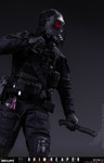 Close up shot highlighting the GPNVG eighteen night vision goggles and FM fifty three gas mask attached to the helmet system