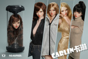 This photograph shows the frontal view of the KID KING KKP005 Carlin Girl head sculpt highlighting the detailed facial features and realistic eyes.