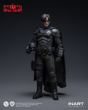 This image displays the full body presentation of the figure highlighting the intricate fabric tailoring and armored components of the costume.