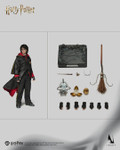 A top down view displaying all the included accessories like the golden egg and the firebolt broomstick.