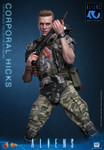 This full body studio shot displays the Corporal Hicks action figure standing in a combat pose while aiming the iconic pulse rifle.