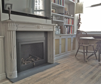Louis XVI Marble Mantel expands the look and feel of this space