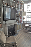 Louis XVI Marble Mantel provides a cohesive focal point 