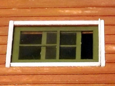 O scale sliding sash windows with trim.