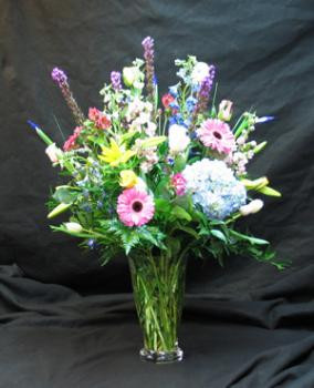 A lovely selection of flowers to express your sympathy, for the home or the funeral home.The flowers can be designed to compliment the changing seasons