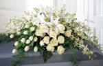 Resplendent with roses, Tulips, orchids, and lilies, this spray is an elegant and sophisticated display.