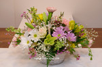 Spring basket made with a mixture of our freshest, seasonal blooms.