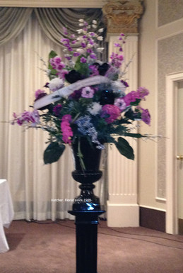 Large artificial arrangement we made at our flower shop for a school's commencement.