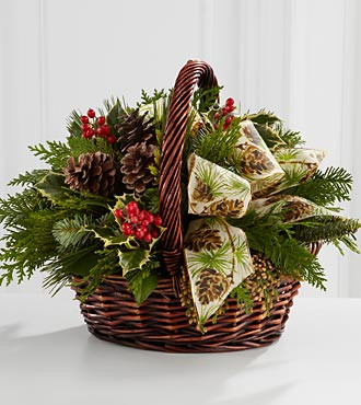 Christmas Coziness™ Bouquet is an expression of holiday homecoming and heartfelt cheer. Assorted holiday greens, variegated holly, natural pinecones, red berry pics, and cinnamon sticks are lovingly arranged in a dark brown bamboo basket accented with an ivory holiday ribbon to create a seasonal sentiment of peace and goodwill.