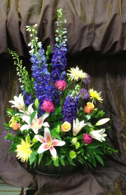 Large basket of flowers for you send with your most heartfelt sentiments.