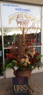 Here is an example of our custom made Winter urn. This one is on the upper end of our price point. Call today for a price. We create them at your location, Toronto, North York,  Thornhill and Richmond Hill.