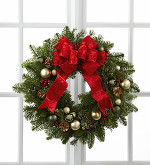 The FTD® Winter Wonders™ Wreath showcases the festive feelings and holiday cheer of the season. Comprised of assorted holiday greens this wreath is accented with gold pine cone pics, berry pics, assorted green glass balls, opalescent pearl glass balls and matte gold glass balls culminating in a brilliant red ribbon tied at the top to create an incredible wreath to celebrate the Christmas season.