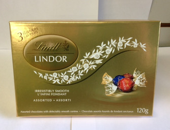 Three flavours of famous Lindt Lindor truffles in a gold box. 120 grams of soft delectable chocolate goodness.
