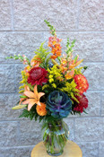 Fall vase with solidago and kale, asiatic lilies, fluffy bronze chrysanthemums, dahlias, mixed foliage and snapdragons. Send this lovely burst of Fall vase. For Rosh Hashanah, a birthday or just because you love Fall. Florist fresh from our Toronto and North York flower shop. 
